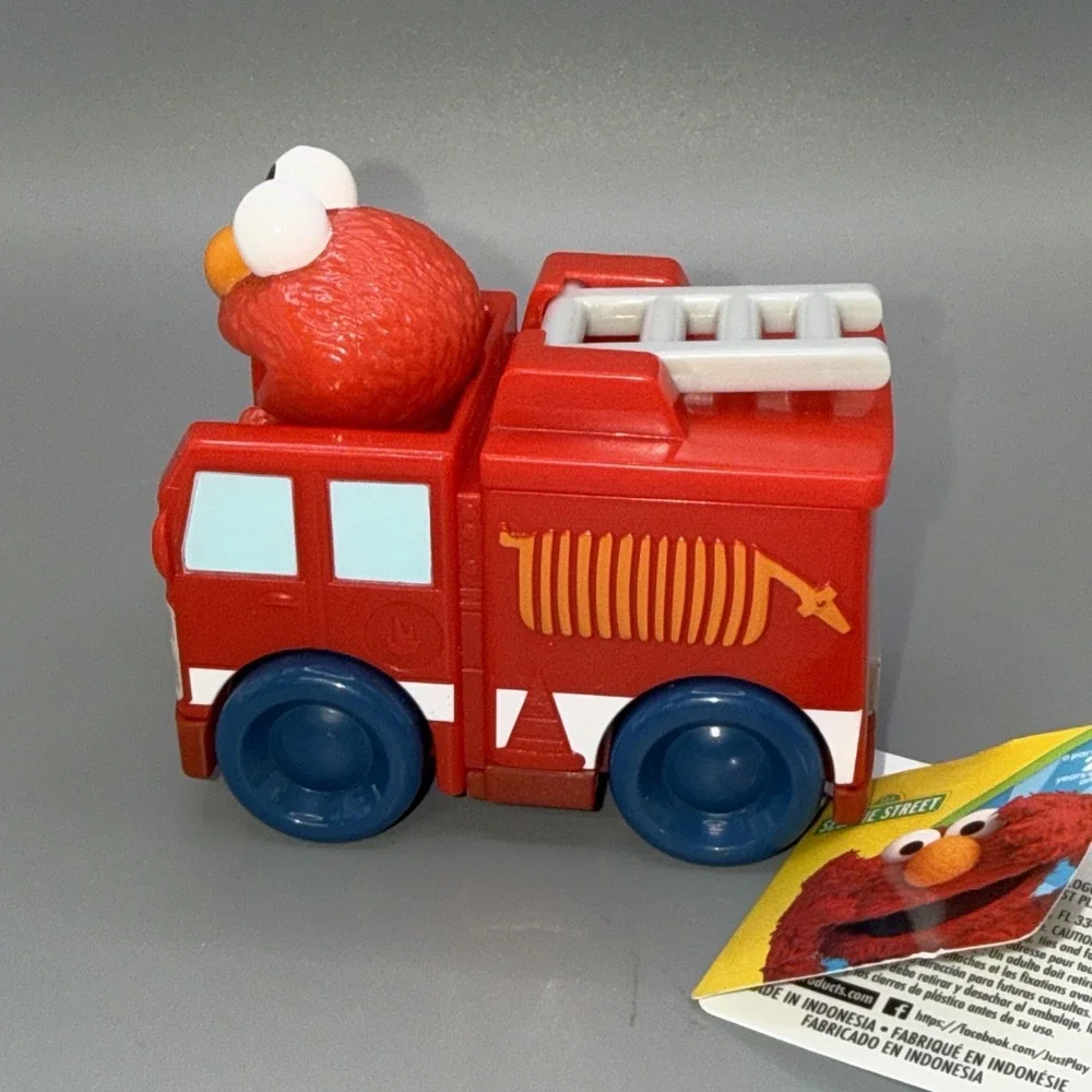 Sesame Street Twist & Pop Wheelies Elmo Fire Truck Vehicle